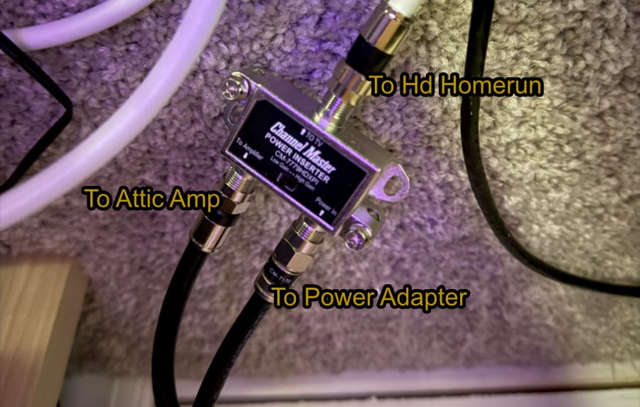 Coaxial cable connected to the power inserter and HDHomeRun device indoors